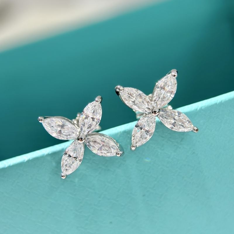 T*f*ny earrings